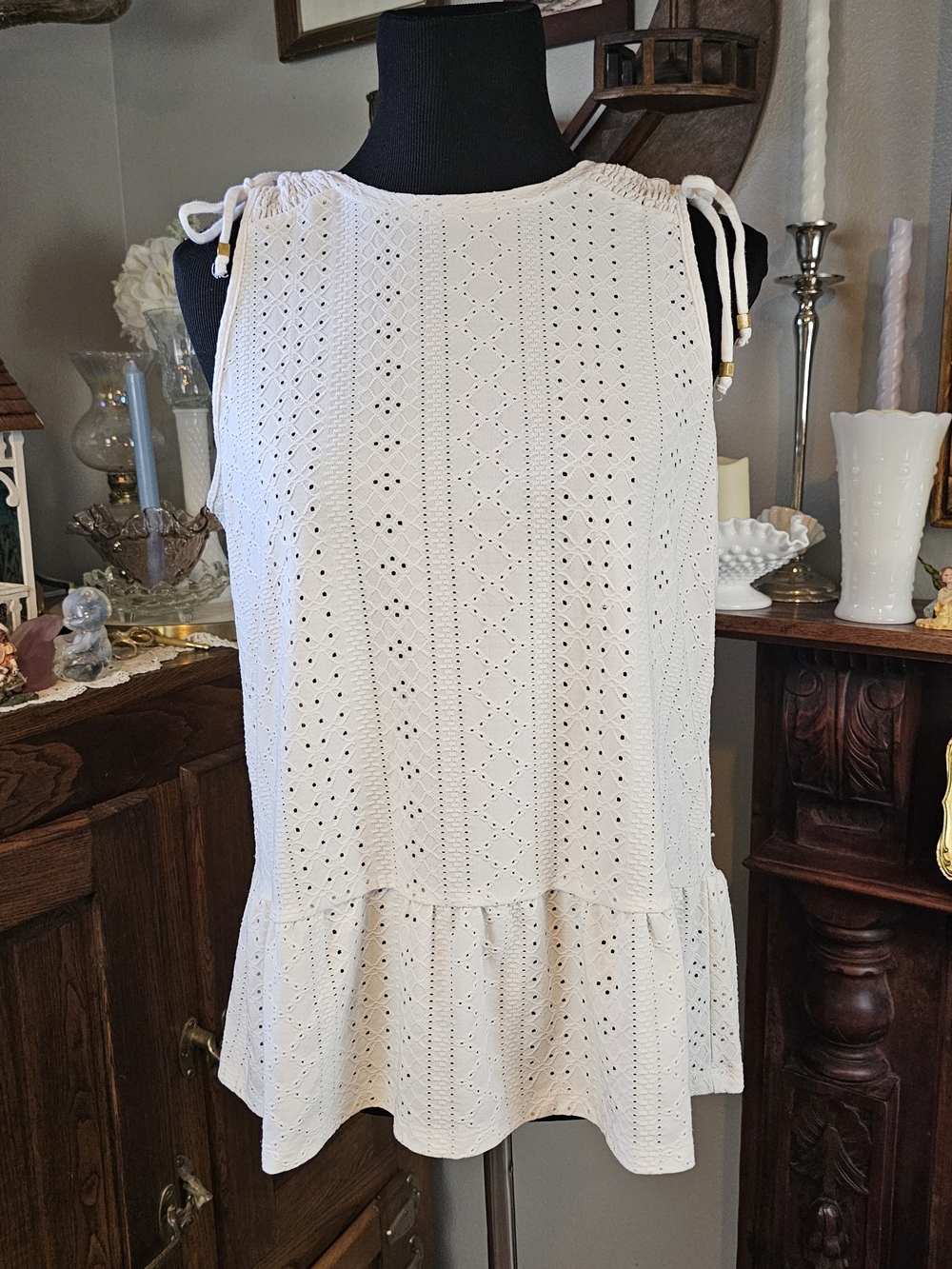 Michael Kors white sleeveless peplum top in a women's size Medium featuring an a